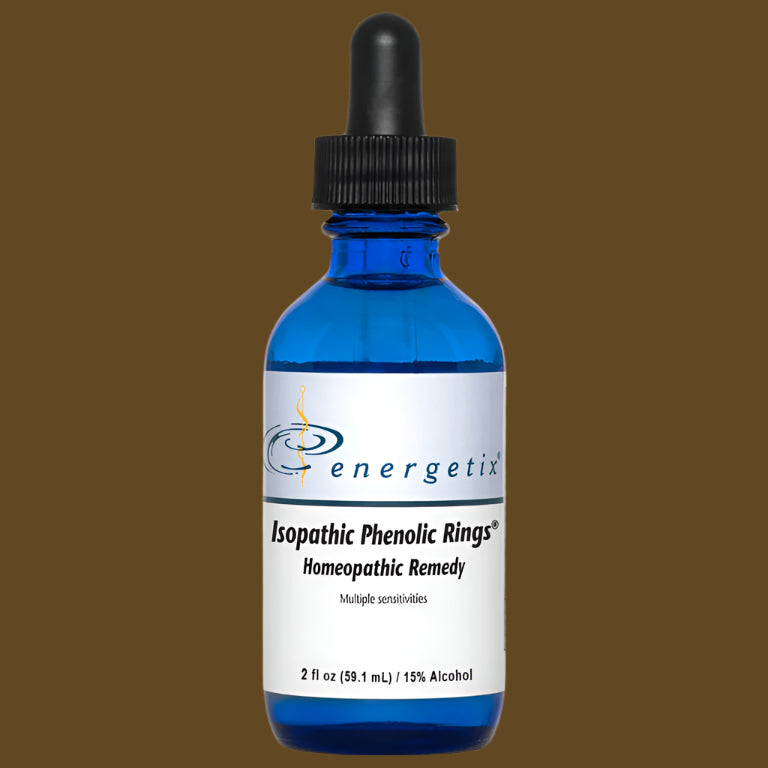 Blue dropper bottle labeled 'energetix' on a brown background