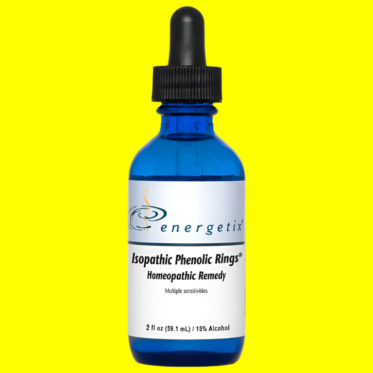 Blue dropper bottle labeled energetix isopathic phenolic rings on a yellow background