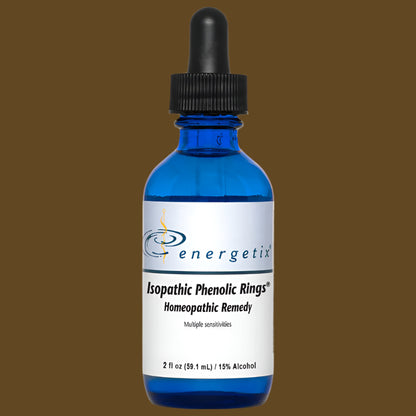 Blue dropper bottle labeled 'energetix' on a brown background